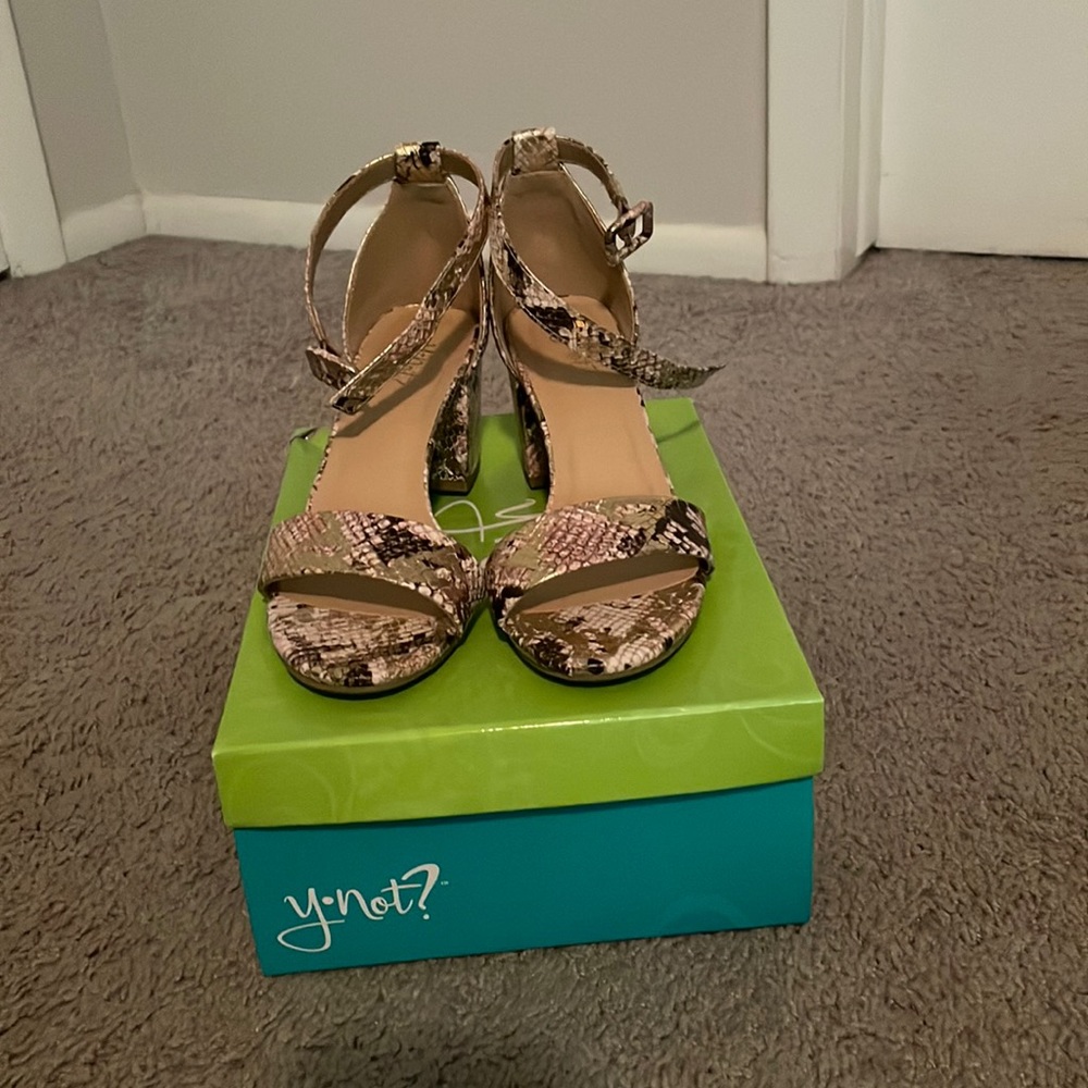 Gold with leopard pattern. Thick cake heel with open toe and ankle straps.
